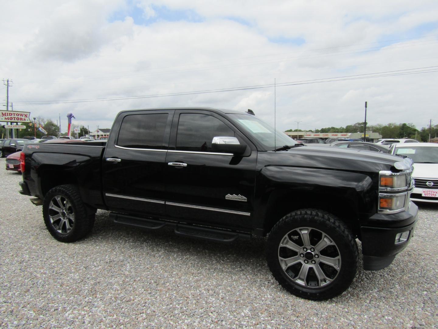 2015 Black Chevrolet Silverado 1500 High Country Crew Cab 4WD (3GCUKTEJ9FG) with an 6.2L V8 OHV 16V engine, Automatic transmission, located at 15016 S Hwy 231, Midland City, AL, 36350, (334) 983-3001, 31.306210, -85.495277 - Photo#0